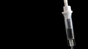 stock-footage-intravenous-drip-loop-background-with-room-for-text-on-the-side